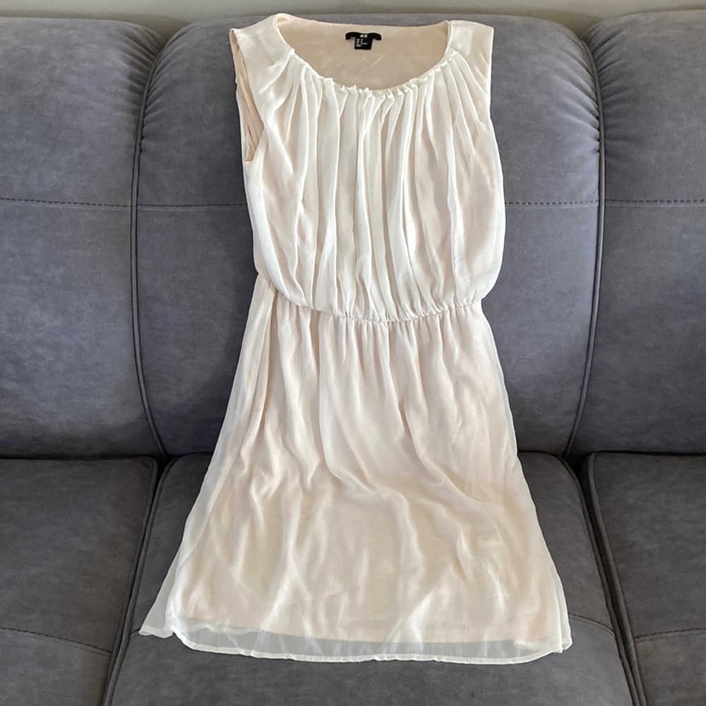 H&M white chiffon dress with strawberry blonde stain lining. Size 8US.
